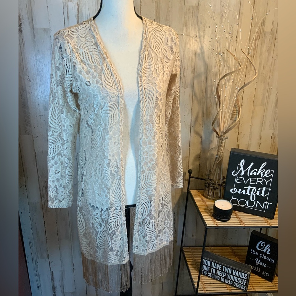 Questions lace cardigan with fringe bottom. Size small